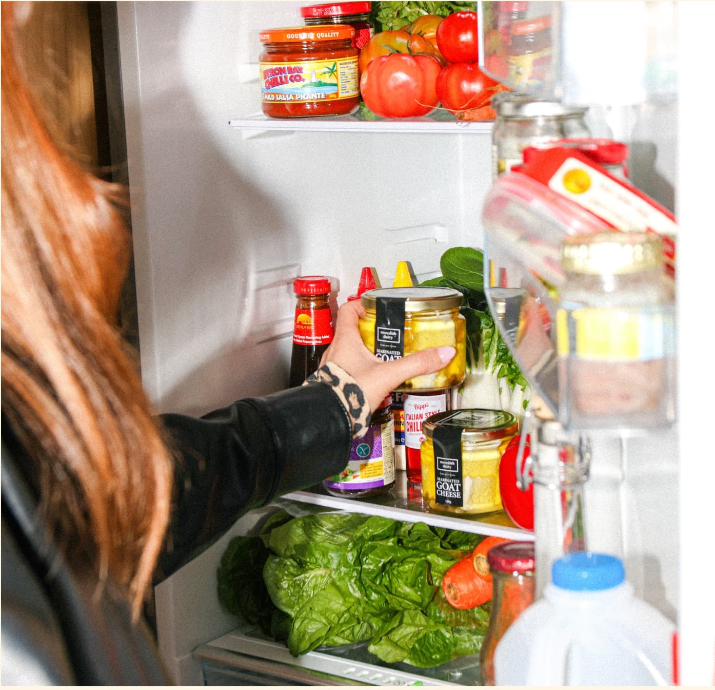 Fresh groceries and products arranged in a refrigerator