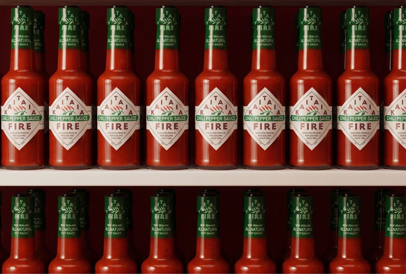 two bottles of hot sauce